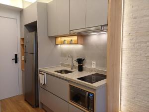 Lindo e espaçoso studio com cama queen e cama solteiro