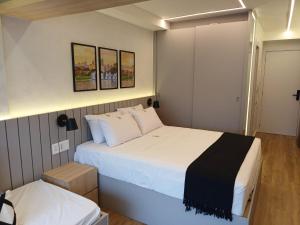 Lindo e espaçoso studio com cama queen e cama solteiro