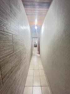 Casa com área gourmet e piscina em Caraguatatuba