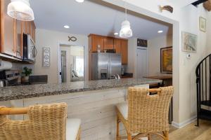 Coastal Charm Awaits in Tiki Time on Topsail!