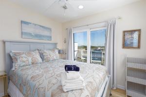 Coastal Charm Awaits in Tiki Time on Topsail!
