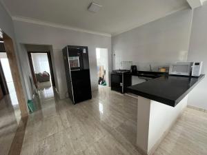 Casa completa perto da Praia Grande e centro