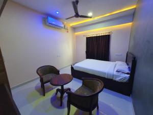 Kousthubam Grand Suites