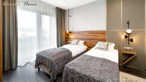 Wonder Hill - klimatyzowane apartamenty z bajkowym widokiem na góry i zalew oraz z dostępem do basenów i jacuzzi