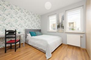 Bemowo Air-conditioned Apartment with Balcony by Noclegi Renters