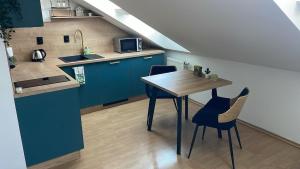 Stairs to heaven - attic apartment in the center of Brno