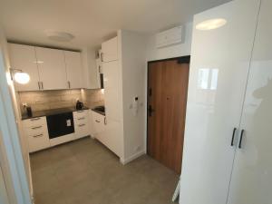 Apartament z 2 pokojami i balkonem Tauron Arena