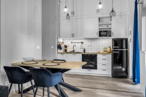 Wola Industrial Apartment by BookingHost