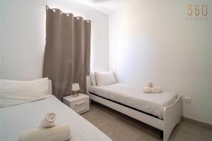 Peaceful Seafront 3BR Apt with Balcony by 360 Estates