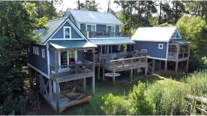 Elevated Cabin in the Trees Perfect for a Weekend Getaway in the Outer Banks, North Carolina