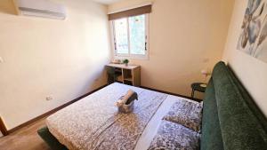 Sunny 2BR Getaway Steps from the Beach with Wi-Fi