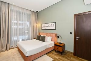 Relax in Comfort with Modern Amenities, Steps from Burj Khalifa and Dubai Mall