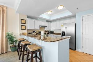 Crystal Shores West 1008 by Youngs Suncoast