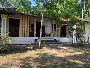 ලෝ LAW Leisure & Wellness Homestay Hostel
