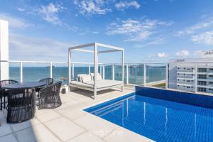 Aptos em Prédio com Piscina a 100 m da Praia - LTT