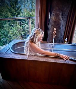 "Tree-T-Ment Center" Spa-Themed Luxury Treehouse with Indoor & Outdoor Soaking Tubs