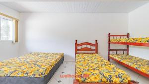 Casa Laranja Perequê Açu Ubatuba SP - GRUPO VIVA UBATUBA