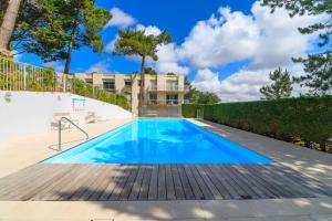 Appartement rénové à Stella-Plage avec piscine chauffée, parking privé gratuit, TV grand écran, boulodrome, à 2km de la plage