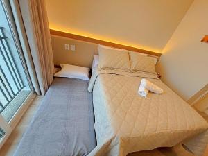 Hospede-se com conforto perto da Rua Coberta