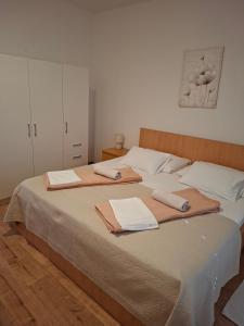 Apartments and rooms with parking space Palit, Rab - 22221