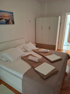 Apartments and rooms with parking space Palit, Rab - 22221