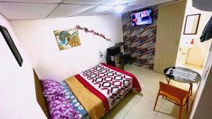 Habitación privada en Playa Dorada con Kitchenette