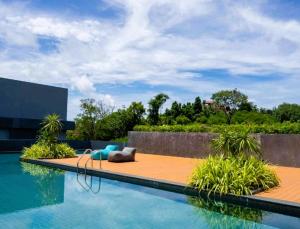 Pool Access 1 Bedroom Duplex UTL A107 near Nai Harn Beach