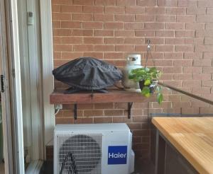 Stylish 1BR Apartment with City Views Mins to CBD