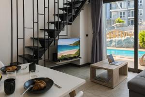 Pool Access 1 Bedroom Duplex UTL A107 near Nai Harn Beach
