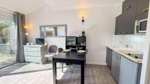 Appartement en résidence avec piscine, cour privée
