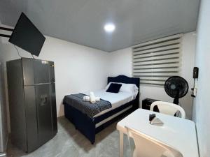 Apartaestudio Vacacional en Girardot, piscinas, Jacuzis, parqueadero para moto