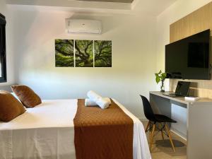 Aptos 1 ou 2 quartos no Centro com Piscina e Academia