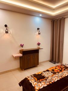 Luxury 2bhk White lotus apartment by Madanan