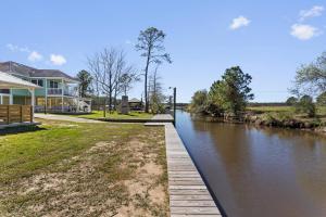 Waterfront Home with Pool by Next Step Property Management