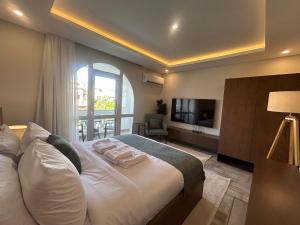 Azure 203 Studio Pool, Garden & Roof - New Cairo