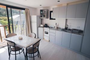 Check and home - Chapa II - 4 huéspedes con patio y parrilla