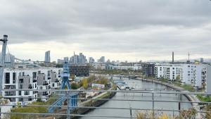 Stylish Riverfront Penthouse with Skyline View