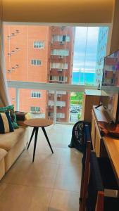 Frente mar com piscina e vista incrível em Santos