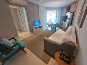 Book Santos Unique 909 com 2 dormitórios para família