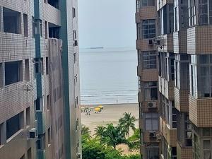 Book Santos Unique 909 com 2 dormitórios para família