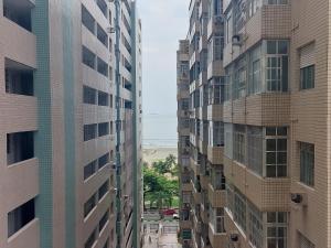 Book Santos Unique 909 com 2 dormitórios para família