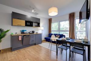 Poddąbek Comfort I Apartamenty z tarasem na dachu, ogródkiem, basenem zewnętrznym i wewnętrznym, salą zabaw i animacjami