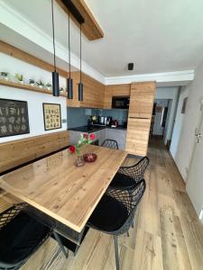 Pragma Apartments - Fiore delle Alpi