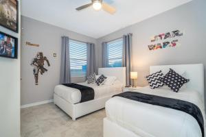 3150-308BR STOREY LAKE, CONDO 32 POOL VIEW