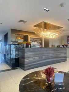 RBR Lux at Novotel Manila Hotel Residences Acqua