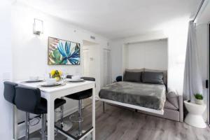 Indulge in 2BR Condo Near CocoWalk with Pool & Gym