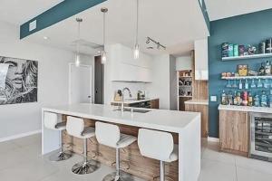 Edgewater Penthouse Retreat with Bay Views