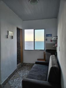 Casa no Vidigal, janela para o mar Favela experiencia de morador