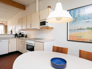 6 person holiday home on a holiday park in Sæby