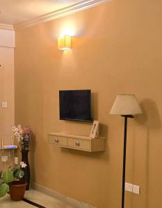 Sundowner Cozy 1 BHK ,5 min Beach ,AC & Balcony
